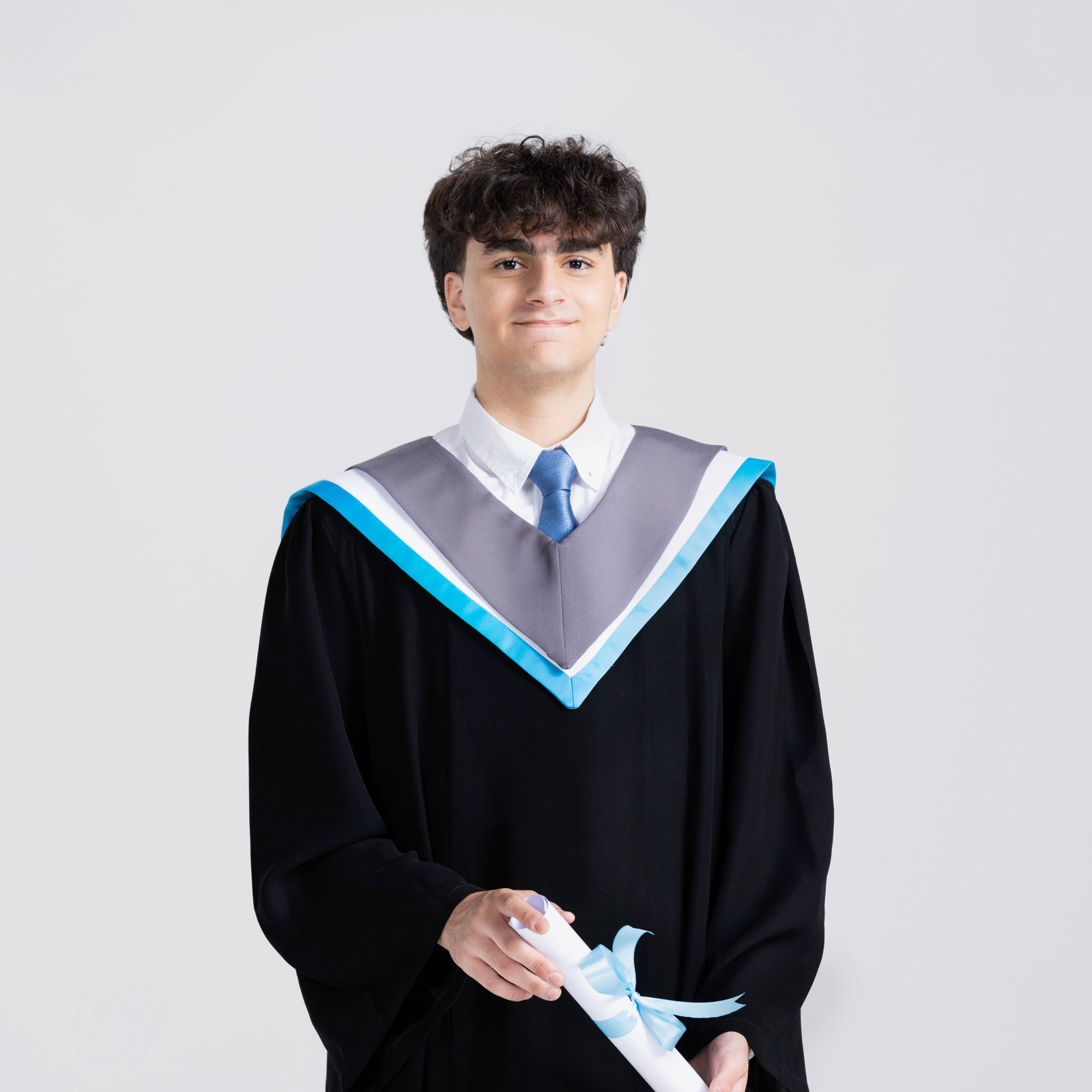 young-graduate-student-making-thumbs-up-white